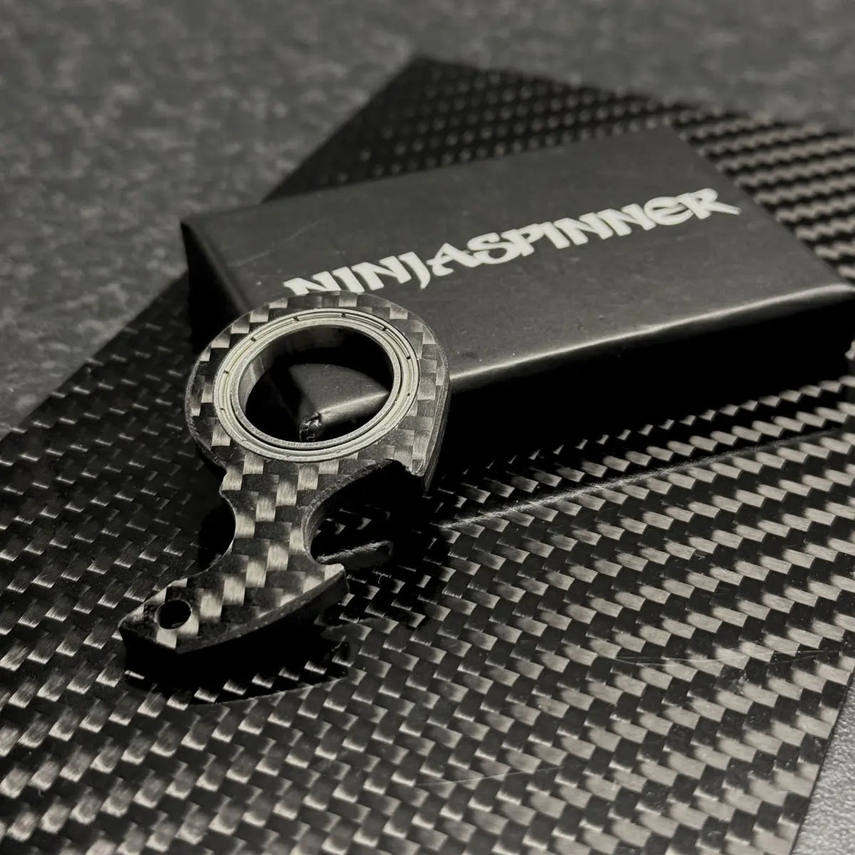Porte-clés NinjaSpinner en fibre de carbone