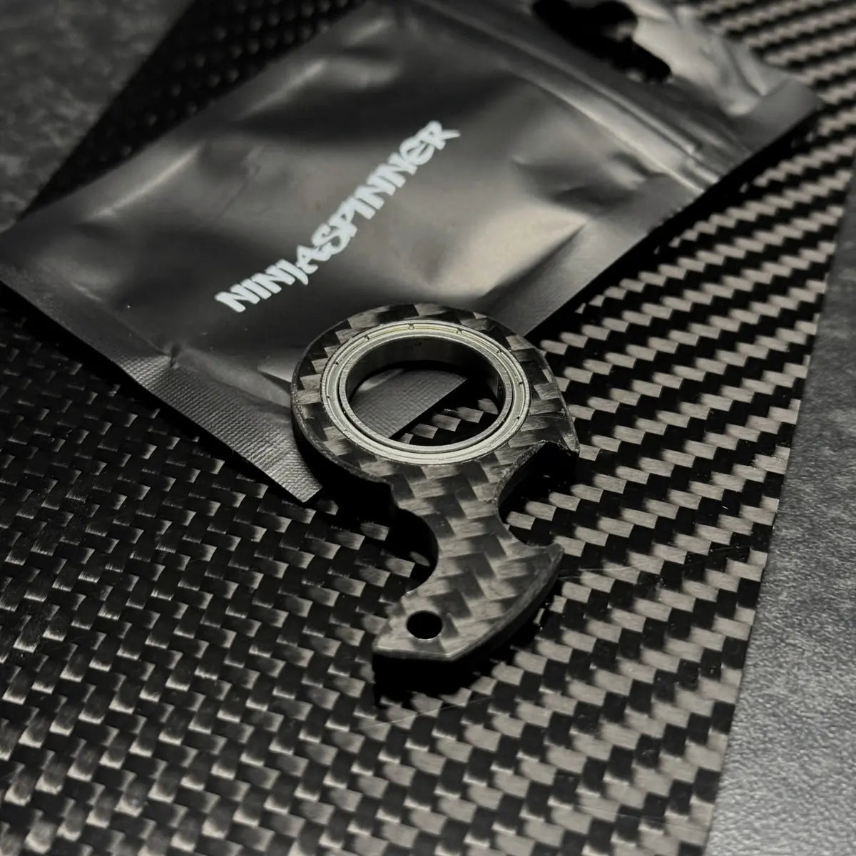 Porte-clés NinjaSpinner en fibre de carbone